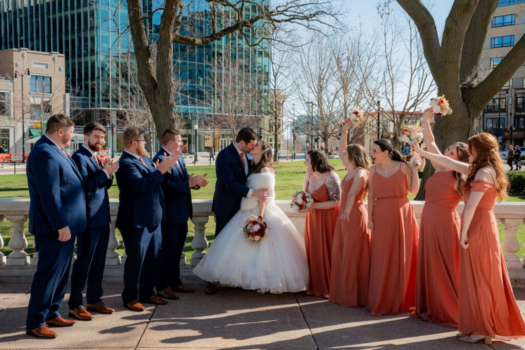 Bridal party celebrating with the bride and groom in Madison.