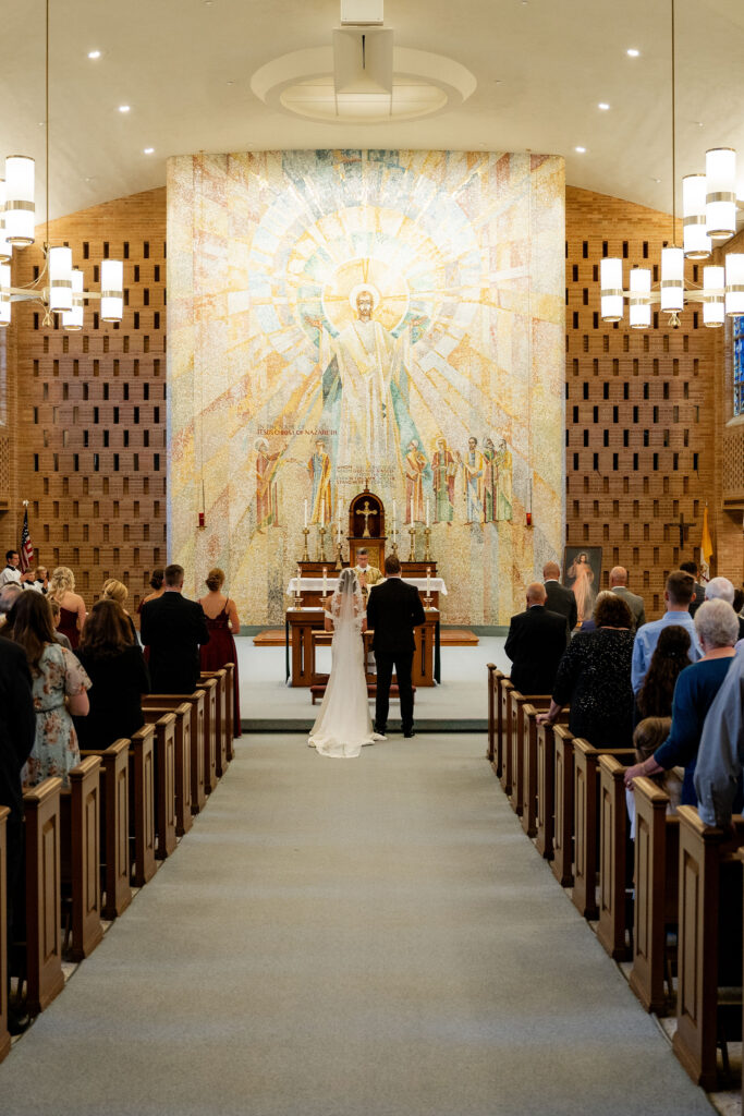 Bride walking down the aisle in Milwaukee, WI.