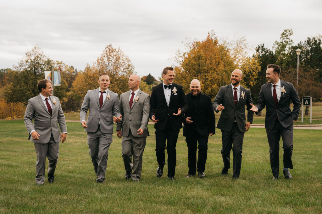 Groom and groomsmen posing before the wedding in Milwaukee.