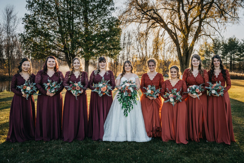 Bride and bridesmaids holding bouquets