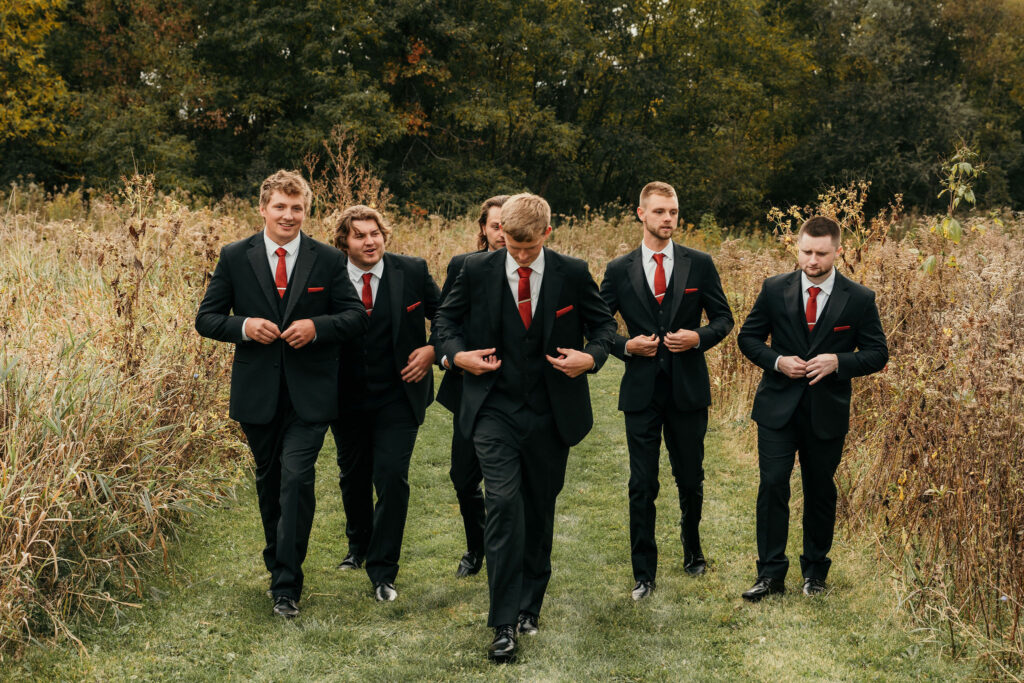 Groom and groomsmen posing