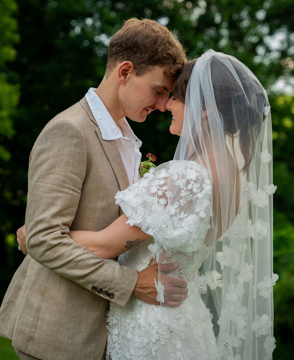 Bride and groom posing- About us